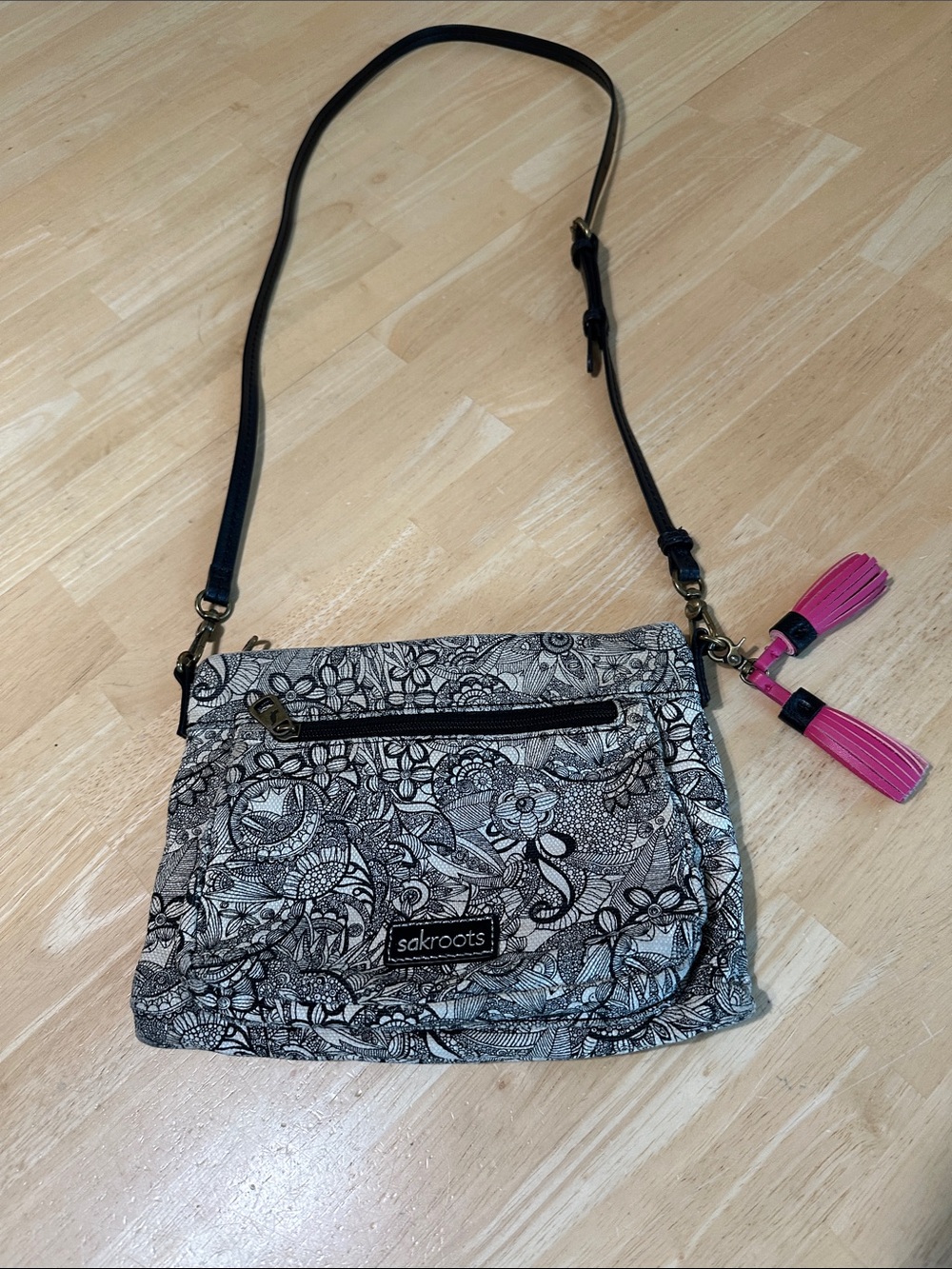 Sakroots Black & White Floral Crossbody with Pink Tassels